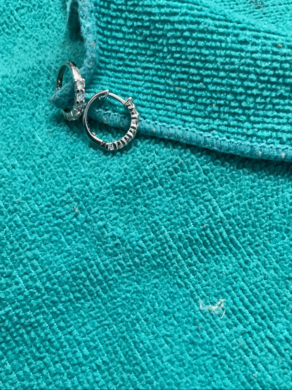 Sterling silver Huggiesearring have zz accents